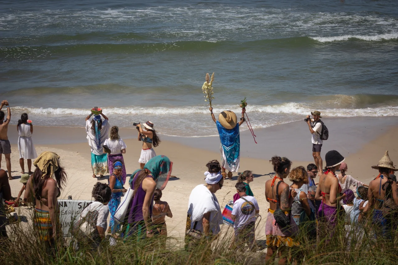 The Iemanjá community gathering on the beach in Rocha